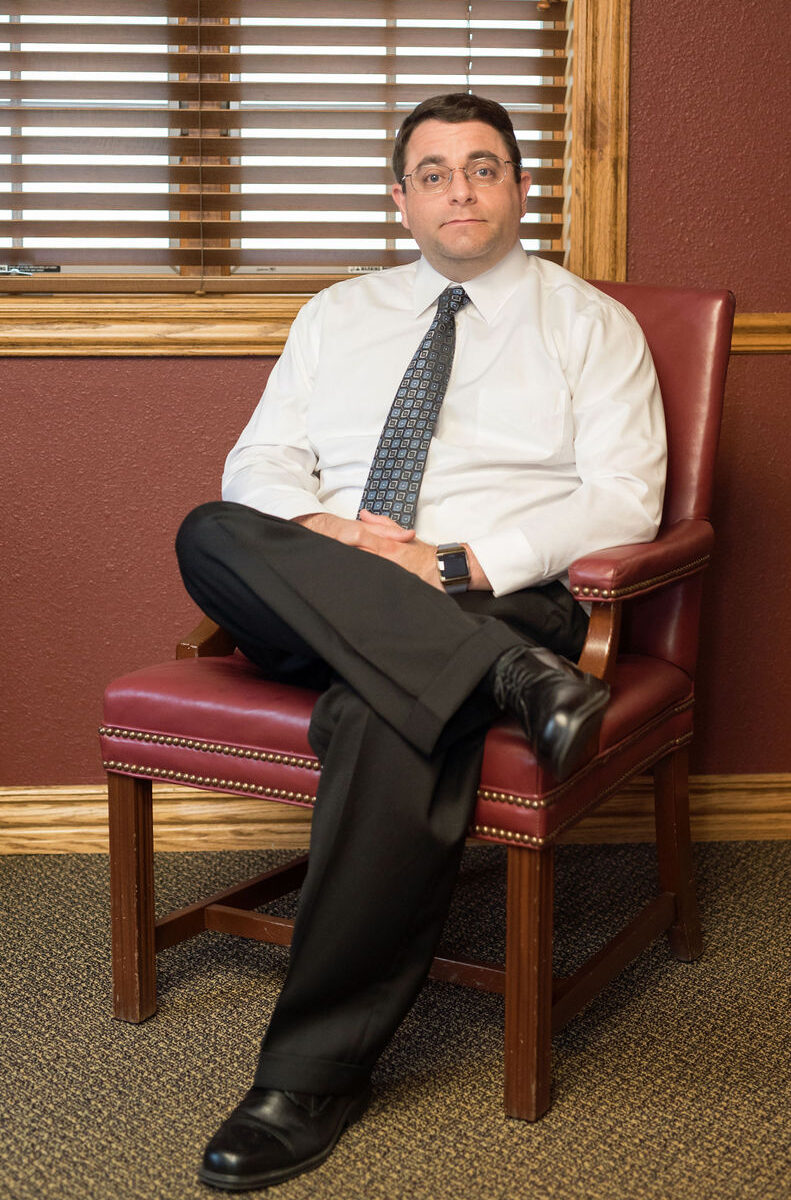Kory D. Stubblefield of Stubblefield Law Office, sits casually in his office.
